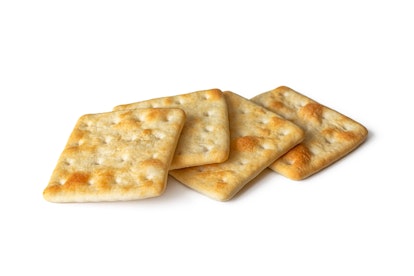 Dry cookies (hardtack), unsalted crackers, with a long shelf life, isolated on a white background