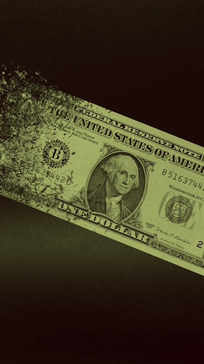 Inflation, dollar hyperinflation with black background. One dollar bill is sprayed in the hand of a ...