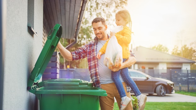 Taking out the trash can be a good household responsibility for children.