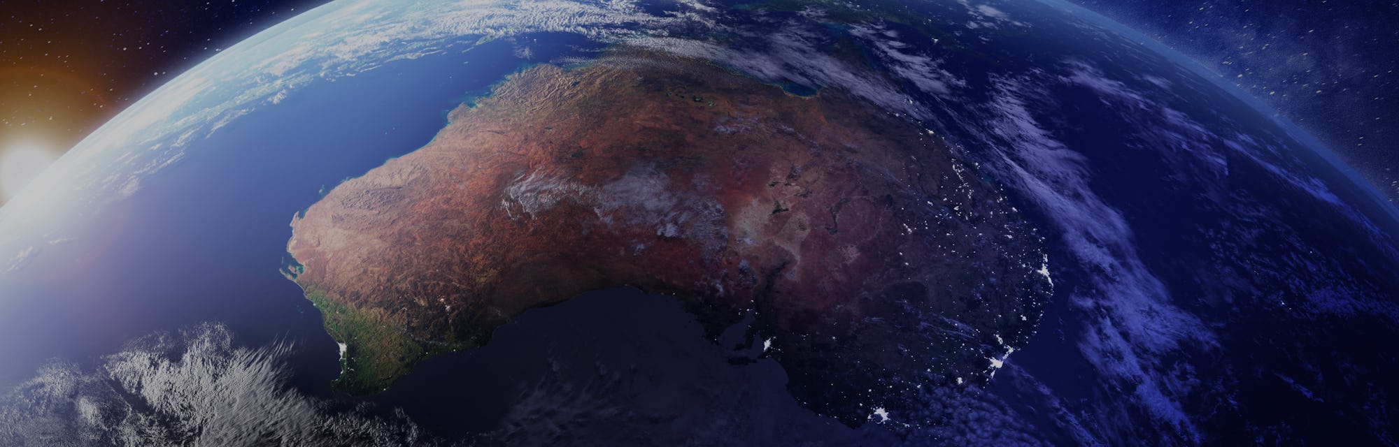 Australia from space at night with city lights of Sydney, Melbourne and Brisbane, view of Oceania, A...