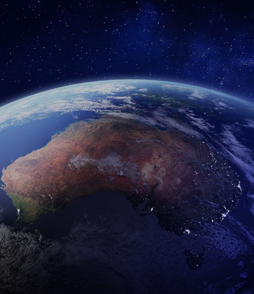 Australia from space at night with city lights of Sydney, Melbourne and Brisbane, view of Oceania, A...