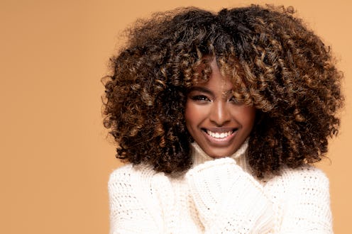 Experts explain everything you need to know about hair plopping for gorgeous curls.