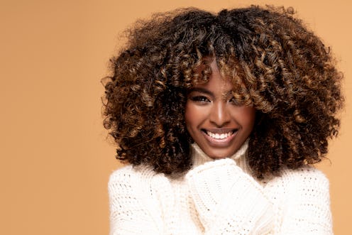 Experts explain everything you need to know about hair plopping for gorgeous curls.
