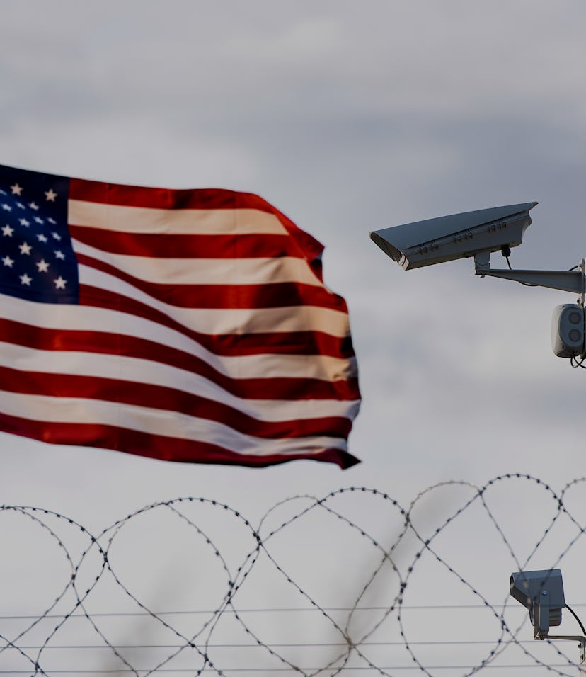 USA border, surveillance camera, barbed wire and USA flag, concept picture