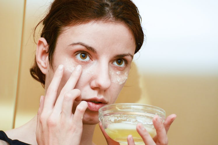 Self picture: Redhead model using albumen or egg white for the dark circles under the puffy, tired e...