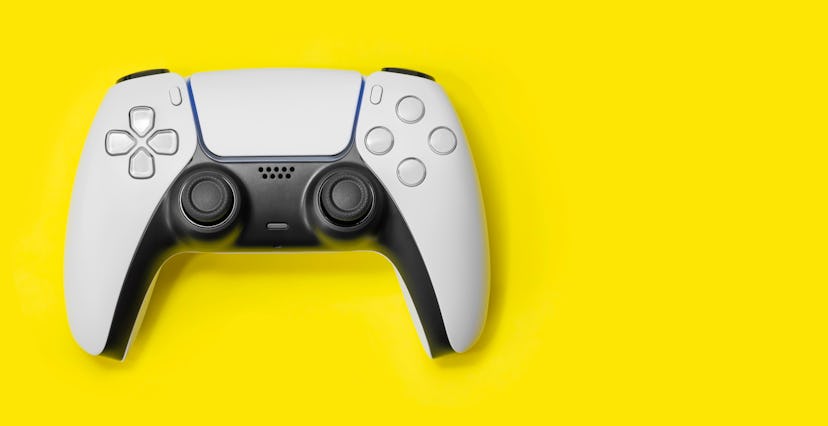 Next Gen game controller on yellow background