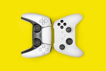 Next gen games controllers on yellow background.