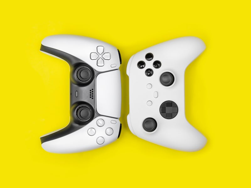 Next gen games controllers on yellow background.