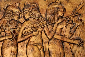 ancient egyptian women in bronze relief