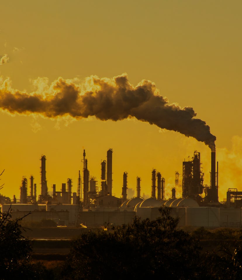 Smoke stacks emmitting carbon pollution into the sky causing climate change