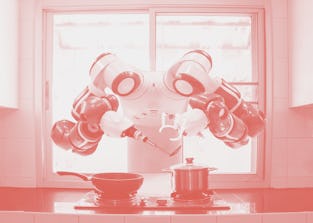 Chef robot Cooking In the kitchen of the future home genius. Intelligent robots work in modern homes...