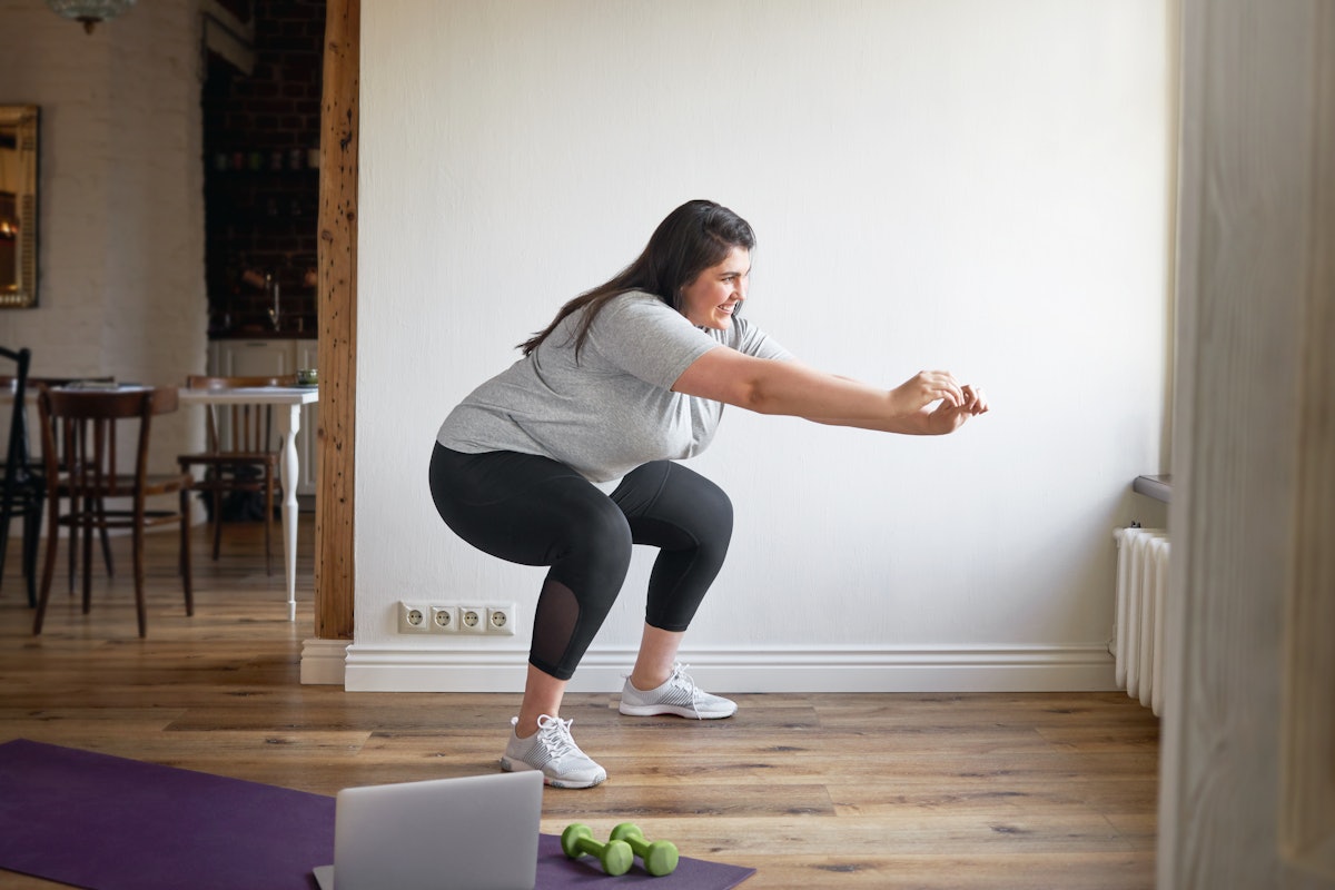 Try an air squat to work the glutes in a Tabata workout session.