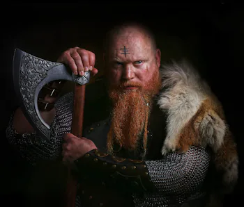 Portrait of viking holding axe shutterstock
