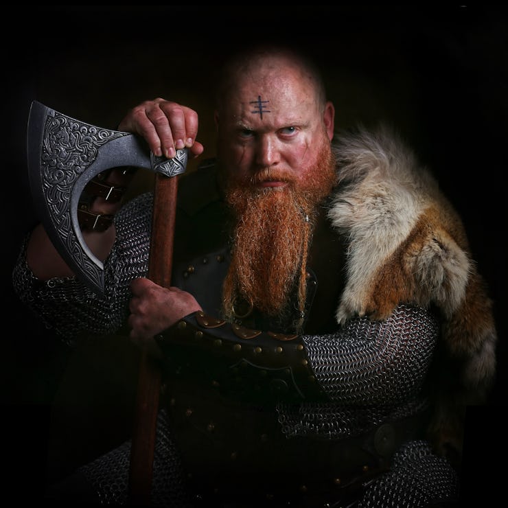 Portrait of viking holding axe shutterstock