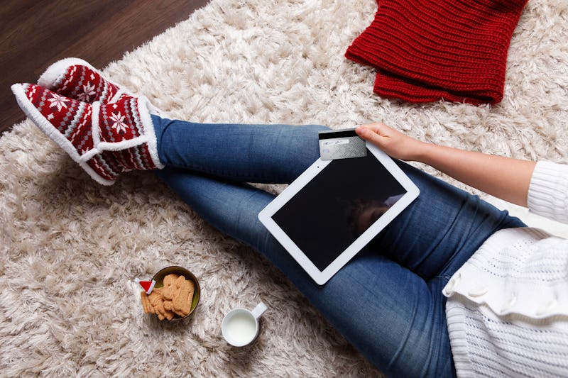 Woman taking a selfie while online shopping