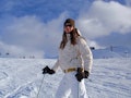 Young woman on ski vacation in the Alps.