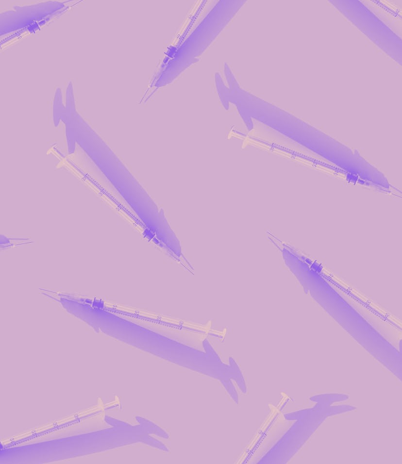 Creative medicinal pattern from syringes of pink background. Colorful concept of New Corona virus 20...