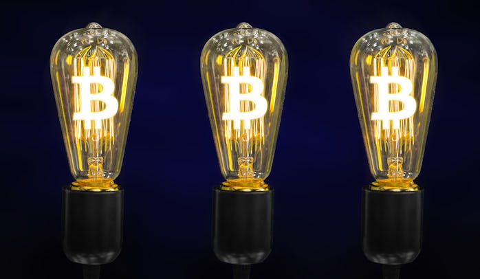 Money making idea. Light bulb with Bitcoin symbol.