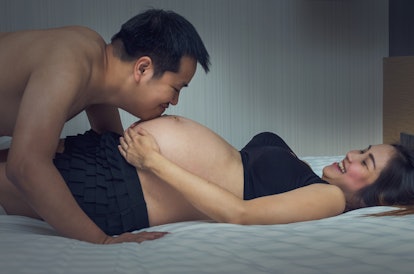 Asian Pregnant female with Lover, family concept, mother day concept
