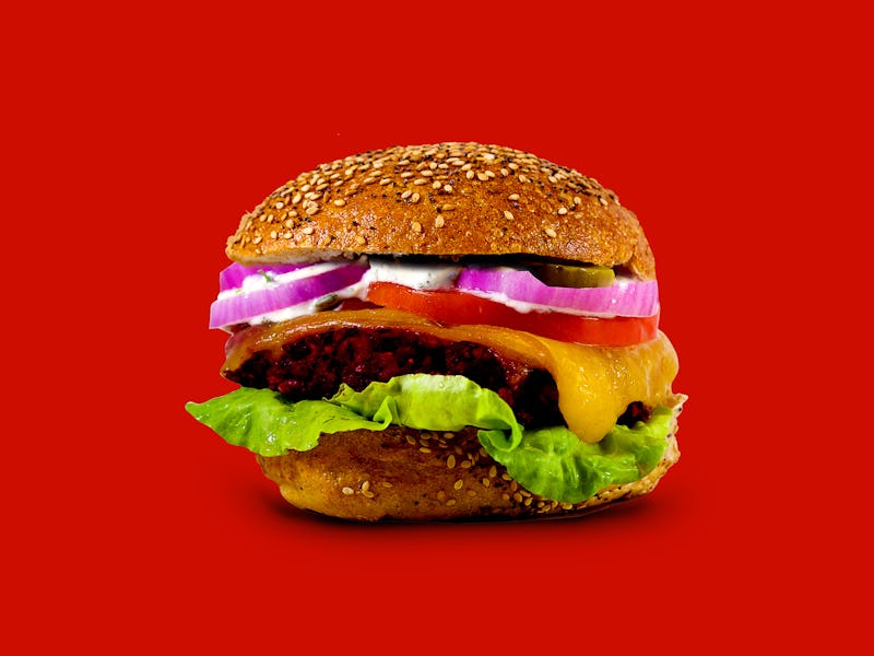Fresh Tasty Burger Isolated On Red Background