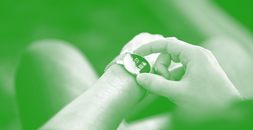 Smart watch, wearable gadget. Man wearing hybrid smartwatch. Wearables with digital touchscreen and ...