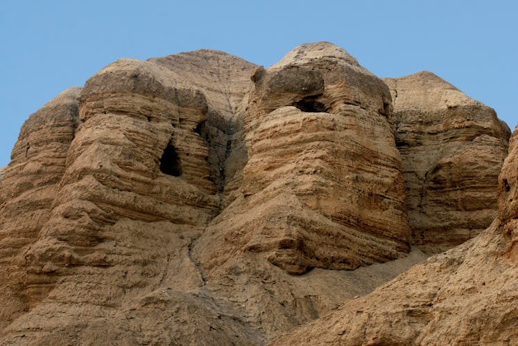 Qumran caves in Qumran National Park near the Dead Sea Israel where the Dead Sea Scrolls discovered ...
