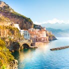 Morning view of Amalfi cityscape on coast line of mediterranean sea, Italy