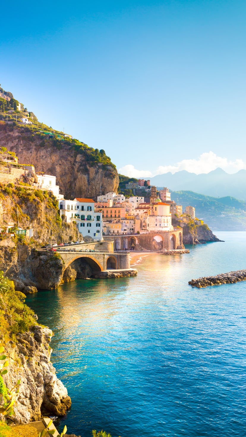 Morning view of Amalfi cityscape on coast line of mediterranean sea, Italy
