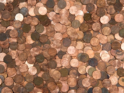 Flat view pennies. United States currency penny, many old new dirty clean viewed from directly above...