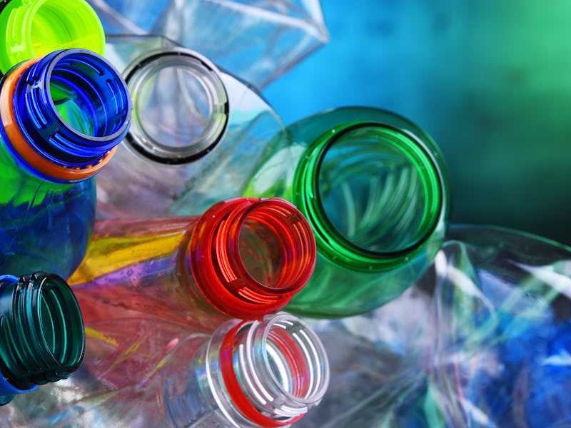 Empty colored carbonated drink bottles. Plastic waste