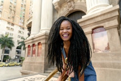 Stunning Black Girl Candid Huge Magic Smile in a Cinematic Warm Urban Scenery Scenery 