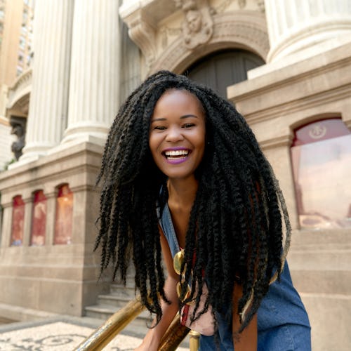 Stunning Black Girl Candid Huge Magic Smile in a Cinematic Warm Urban Scenery Scenery 