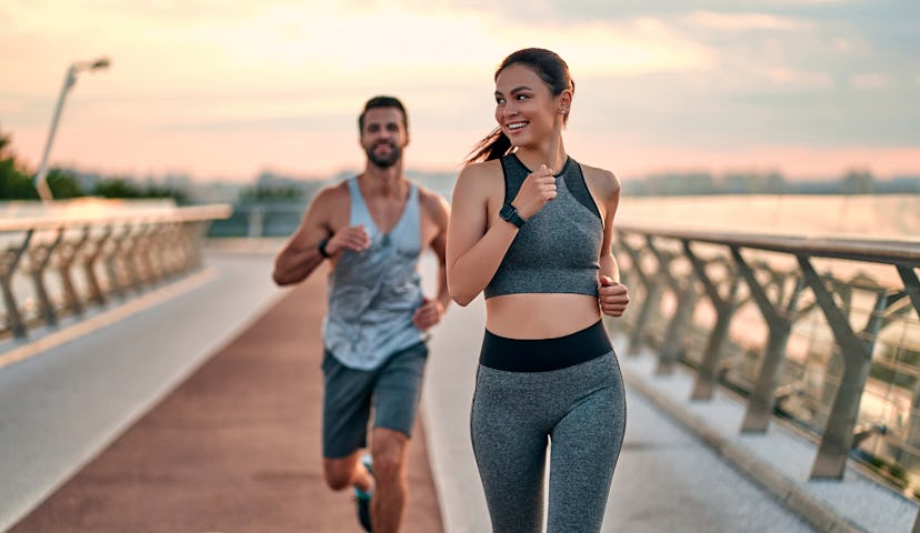 Two friends running together.