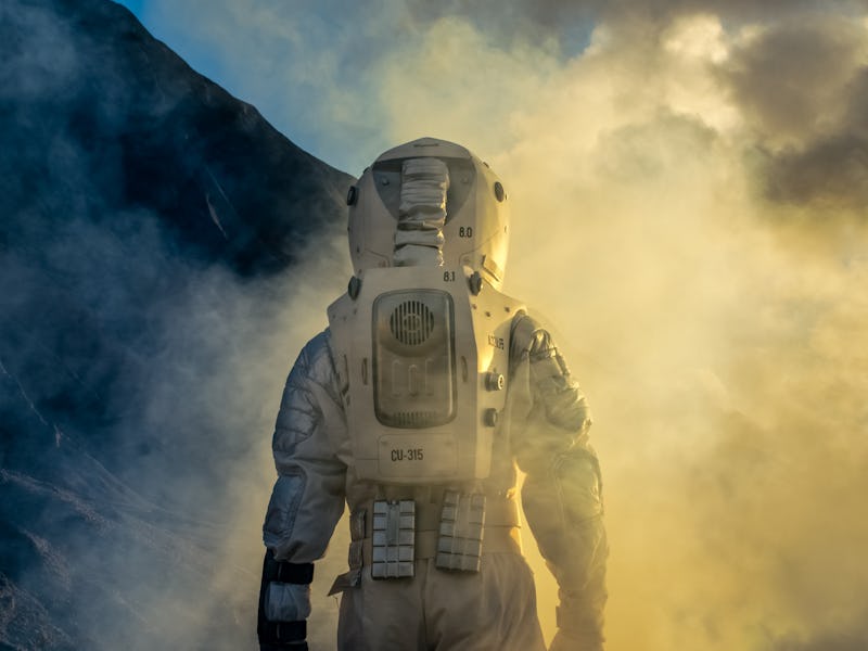 Courageous Astronaut in the Space Suit Explores Mysterious Alien Planet Covered in Mist. Adventure. ...