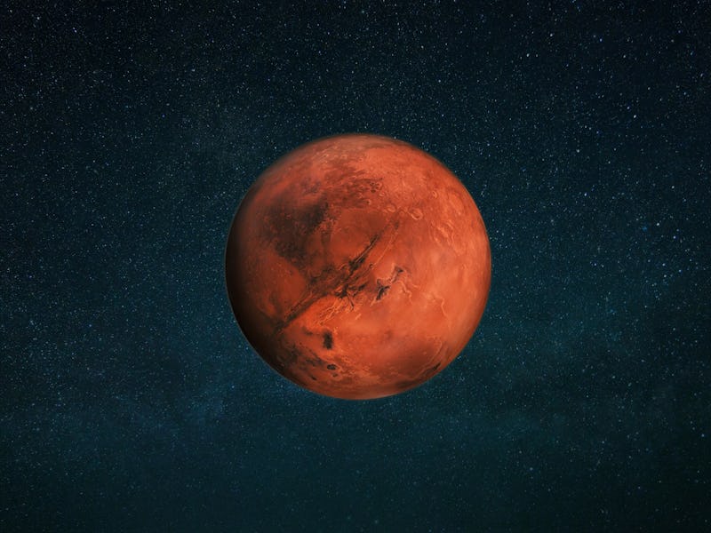 Planet Mars in the starry sky. Red planet in space