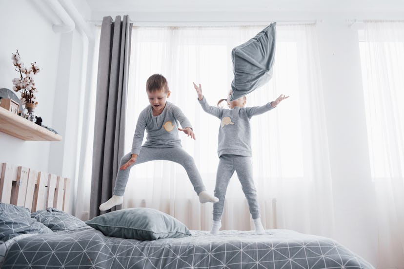 two siblings jumping on the bed, when is national brothers day