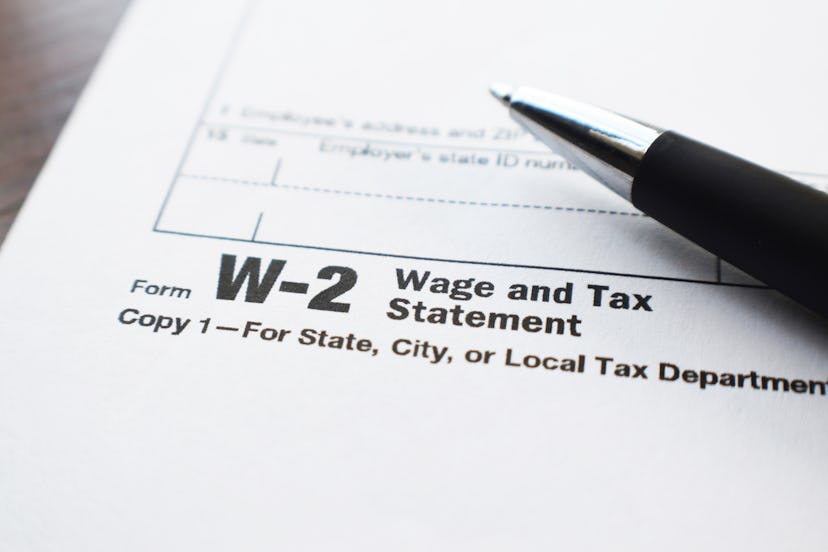 Tax Form W-2 Close Up With Pen