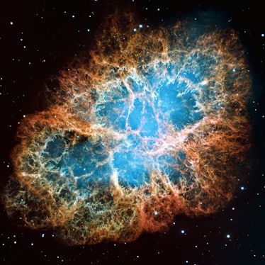 Detailed image of the Crab Nebula in constellation Taurus, blue and orange colors, elements of this ...