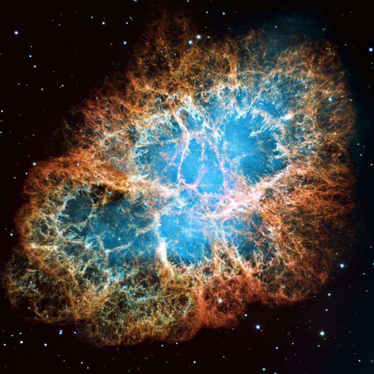 Detailed image of the Crab Nebula in constellation Taurus, blue and orange colors, elements of this ...
