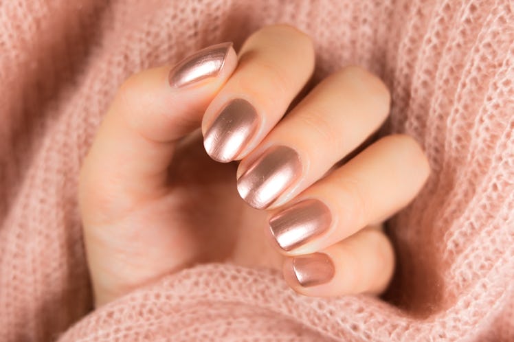 Golden manicure.