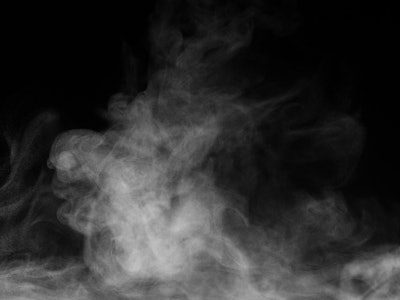 Blur white water vapour on isolated black background. Abstract of steam with copy space. Steam flow....