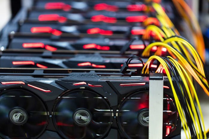 Bitcoin and cryptocurrency miner - a mining computer. Close-up on several GPU