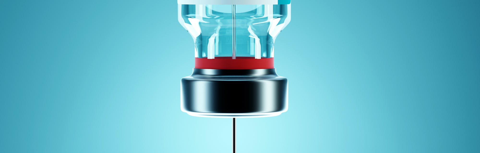 SARS - CoV2 Vaccine concept. A medical needle entering into a glass vial of COVID-19 Vaccine. Medica...