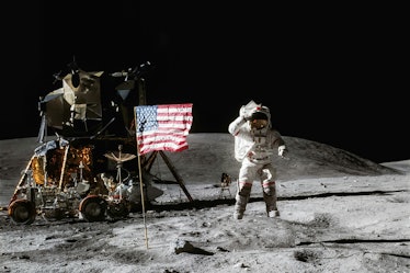 Astronaut on lunar moon landing mission Apollo 11.Astronaut space walk on moon with lunar orbitor sp...