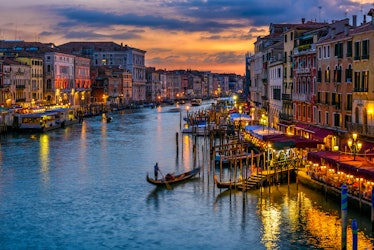 Grand Canal with gondolas in Venice, Italy. Sunset view of Venice Grand Canal. Architecture and land...