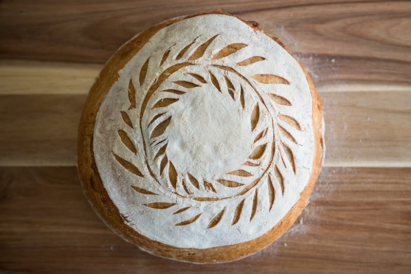 Home baked sourdough bread with scoring