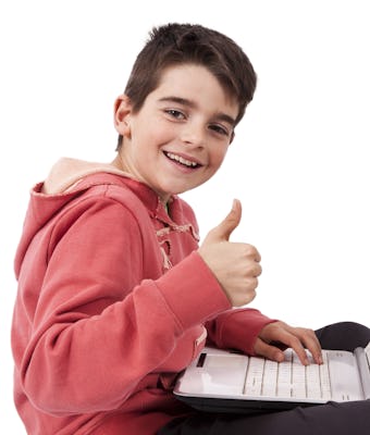 child with computer isolated on white