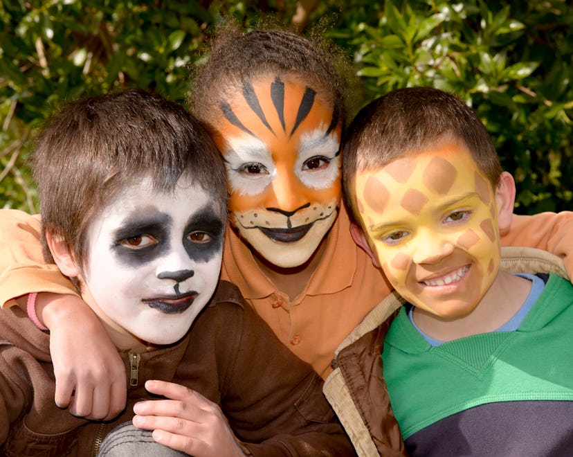 little kids with face painted