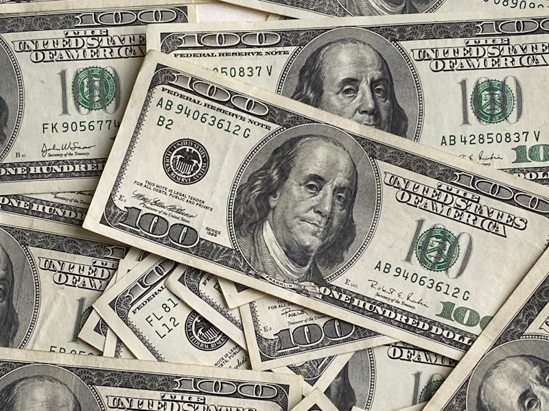 bills of 100 dollar american paper vintage money cash. View from above.