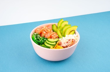 An overhead diagonal, isometric projection photo of poke bowl, traditional Hawaiian and Japanise raw...